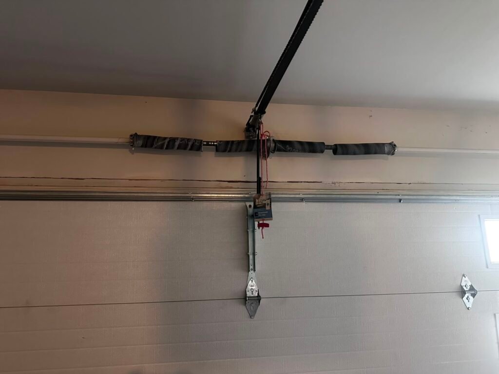 New torsion spring installed after repair